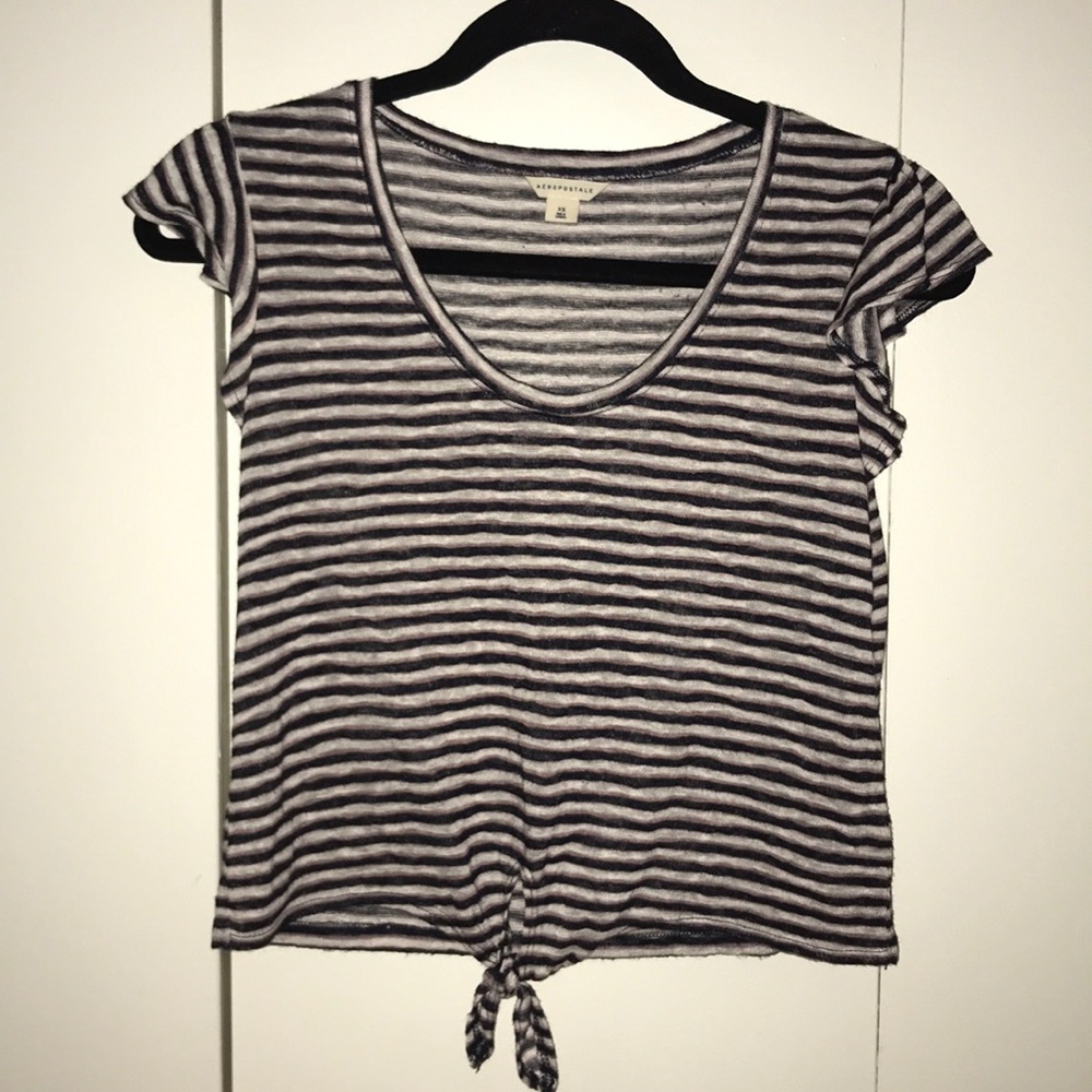 black, white, and light pink striped shirt